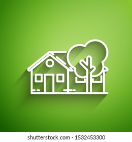 White line Eco friendly house icon isolated on green background. Eco house with tree.  Vector Illustration
