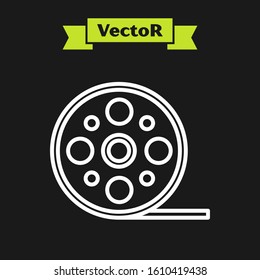 White line Film reel icon isolated on black background.  Vector Illustration