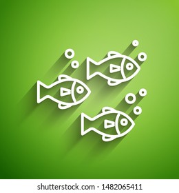 White line Fish icon isolated on green background.  Vector Illustration