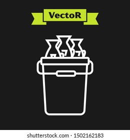 White line Fishing bucket with fishes icon isolated on black background. Fish in a bucket.  Vector Illustration