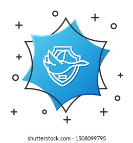 White line Flying duck on shield icon isolated on white background. Hunting trophy on wall. Blue hexagon button. Vector Illustration