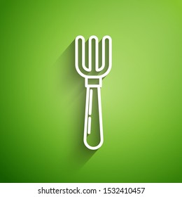 White line Fork icon isolated on green background. Cutlery symbol.  Vector Illustration