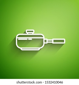 White line Frying pan icon isolated on green background. Fry or roast food symbol.  Vector Illustration