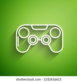 White line Gamepad icon isolated on green background. Game controller.  Vector Illustration