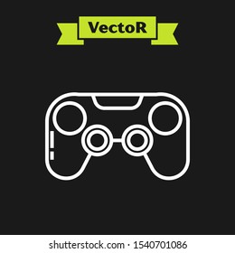 White line Gamepad icon isolated on black background. Game controller.  Vector Illustration
