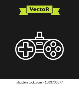 White line Gamepad icon isolated on black background. Game controller.  Vector Illustration