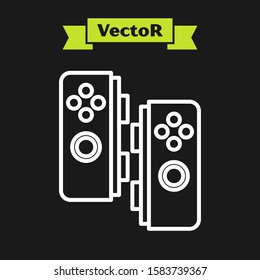 White line Gamepad icon isolated on black background. Game controller.  Vector Illustration