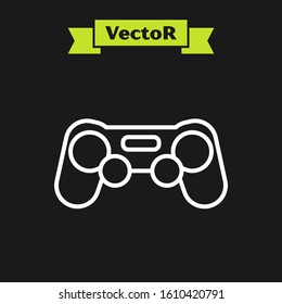 White line Gamepad icon isolated on black background. Game controller.  Vector Illustration