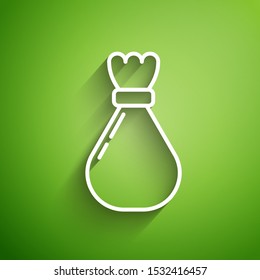 White line Garbage bag icon isolated on green background.  Vector Illustration