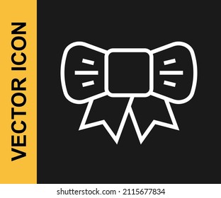 White line Gift bow icon isolated on black background.  Vector