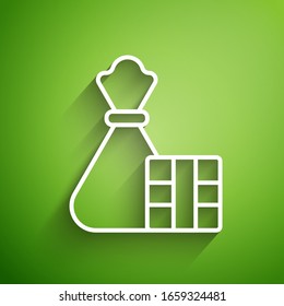 Caja de regalo de línea blanca e icono de bolsa aislado en fondo verde. Feliz Navidad y Feliz Año Nuevo. Ilustración vectorial