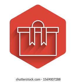 White line Gift box icon isolated with long shadow. Merry Christmas and Happy New Year. Red hexagon button. Vector Illustration