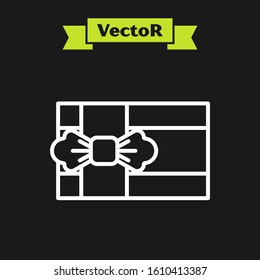 White line Gift box icon isolated on black background.  Vector Illustration