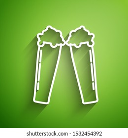 White line Glass of beer icon isolated on green background.  Vector Illustration
