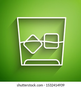 White line Glass of whiskey and ice cubes icon isolated on green background.  Vector Illustration