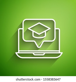 White line Graduation cap on screen laptop icon isolated on green background. Online learning or e-learning concept.  Vector Illustration