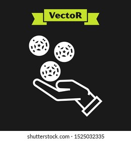 White line Hand holding casino chips icon isolated on black background. Casino gambling.  Vector Illustration