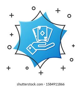 White line Hand holding deck of playing cards icon isolated on white background. Casino gambling. Blue hexagon button. Vector Illustration