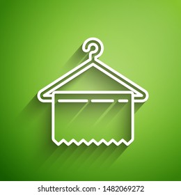 White line Hanger wardrobe icon isolated on green background. Clean towel sign. Cloakroom icon. Clothes service symbol. Laundry hanger sign.  Vector Illustration