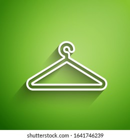 White line Hanger wardrobe icon isolated on green background. Cloakroom icon. Clothes service symbol. Laundry hanger sign.  Vector Illustration