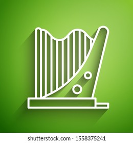 White line Harp icon isolated on green background. Classical music instrument, orhestra string acoustic element.  Vector Illustration
