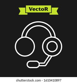 White line Headphones icon isolated on black background. Earphones. Concept for listening to music, service, communication and operator.  Vector Illustration