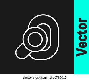 White line Hearing aid icon isolated on black background. Hearing and ear.  Vector