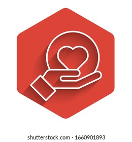White line Heart on hand icon isolated with long shadow. Hand giving love symbol. Red hexagon button. Vector Illustration
