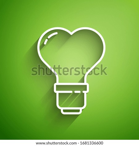 White line Heart shape in a light bulb icon isolated on green background. Love symbol. Valentine day symbol.  Vector Illustration