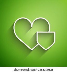 White line Heart with shield icon isolated on green background. Love symbol. Insurance concept. Security, safety, protection, protect concept.  Vector Illustration