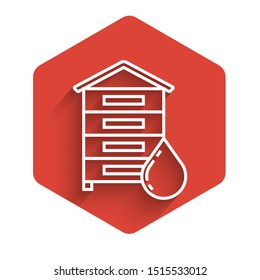 White line Hive for bees icon isolated with long shadow. Beehive symbol. Apiary and beekeeping. Sweet natural food. Red hexagon button. Vector Illustration