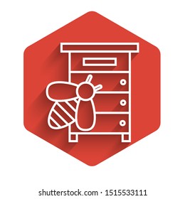 White line Hive for bees icon isolated with long shadow. Beehive symbol. Apiary and beekeeping. Sweet natural food. Red hexagon button. Vector Illustration