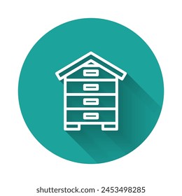 White line Hive for bees icon isolated with long shadow background. Beehive symbol. Apiary and beekeeping. Sweet natural food. Green circle button. Vector