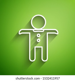 White line Holiday gingerbread man cookie icon isolated on green background. Cookie in shape of man with icing.  Vector Illustration
