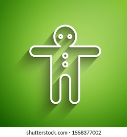 White line Holiday gingerbread man cookie icon isolated on green background. Cookie in shape of man with icing.  Vector Illustration
