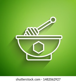 White line Honey dipper stick and bowl icon isolated on green background. Honey ladle.  Vector Illustration