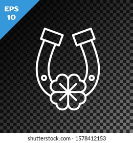 White line Horseshoe with four leaf clover icon isolated on transparent dark background. Happy Saint Patricks day.  Vector Illustration