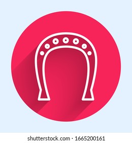 White line Horseshoe icon isolated with long shadow. Red circle button. Vector Illustration