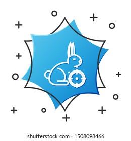 White line Hunt on rabbit with crosshairs icon isolated on white background. Hunting club logo with rabbit and target. Rifle lens aiming a hare. Blue hexagon button. Vector Illustration