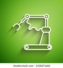 White line Industrial machine robotic robot arm hand factory icon isolated on green background. Industrial robot manipulator.  Vector Illustration