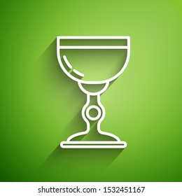 White line Jewish goblet icon isolated on green background. Jewish wine cup for kiddush. Kiddush cup for Shabbat.  Vector Illustration