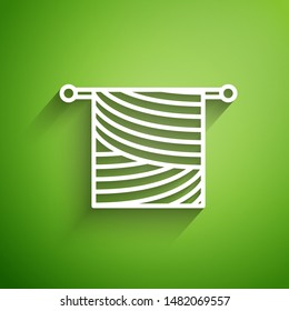 White line Knitting icon isolated on green background. Wool emblem with knitted fabric and needle. Label for hand made, knitting or tailor shop.  Vector Illustration
