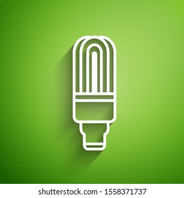 White line LED light bulb icon isolated on green background. Economical LED illuminated lightbulb. Save energy lamp.  Vector Illustration