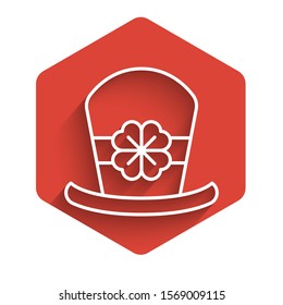 White line Leprechaun hat and four leaf clover icon isolated with long shadow. Happy Saint Patricks day. Red hexagon button. Vector Illustration