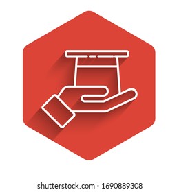 White line Magician hat in hand icon isolated with long shadow. Magic trick. Mystery entertainment concept. Red hexagon button. Vector Illustration