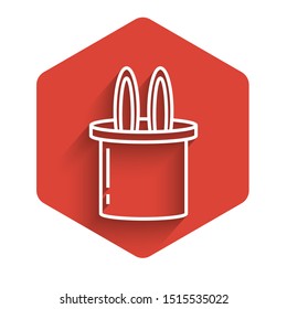 White line Magician hat and rabbit ears icon isolated with long shadow. Magic trick. Mystery entertainment concept. Red hexagon button. Vector Illustration