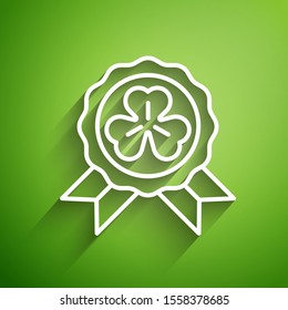 White line Medal with four leaf clover icon isolated on green background. Happy Saint Patrick day.  Vector Illustration