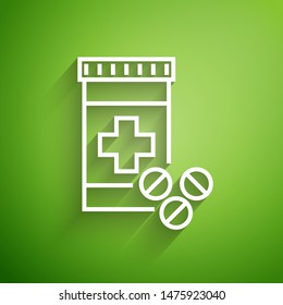 White line Medicine bottle and pills icon isolated on green background. Bottle pill sign. Pharmacy design.  Vector Illustration