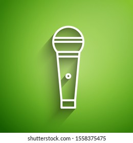 White line Microphone icon isolated on green background. On air radio mic microphone. Speaker sign.  Vector Illustration