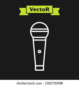 White line Microphone icon isolated on black background. On air radio mic microphone. Speaker sign.  Vector Illustration